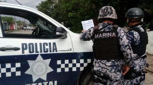 Encuentran restos humanos en camionetas de Tuxpan, Veracruz