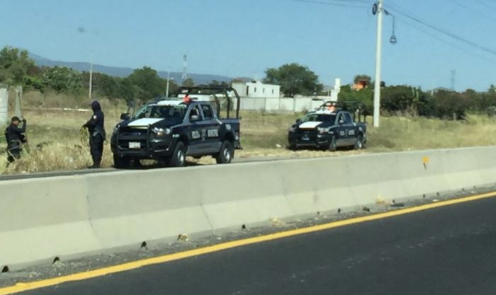 Localizan cuerpo de una mujer en la carretera Atlixco-Izúcar