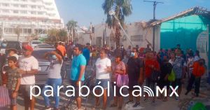 Crónica: Entre aplausos llega apoyo poblano a zonas devastadas por Otis en Acapulco