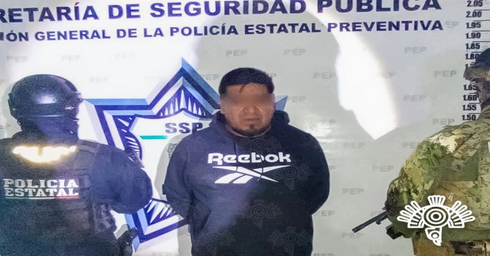 Detienen a Jaime, llevaba arma 9 milímetros y cartuchos en calles de San Miguel Canoa