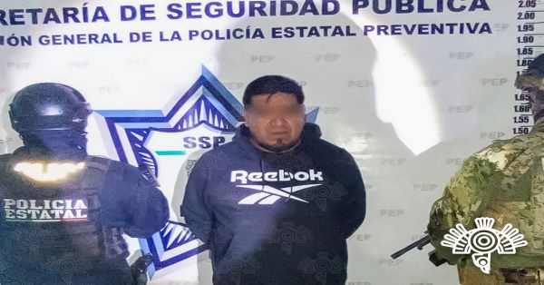 Detienen a Jaime, llevaba arma 9 milímetros y cartuchos en calles de San Miguel Canoa