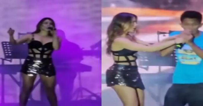 Interrumpen concierto de María León y joven le quita el micrófono