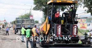 Reducen 13 trenes de pavimentaci&oacute;n costos de obra hasta una tercera parte: Armenta