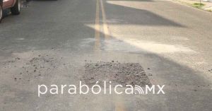 Reincide Agua de Puebla en da&ntilde;os a las calles; ahora afectan la calle 7 Sur